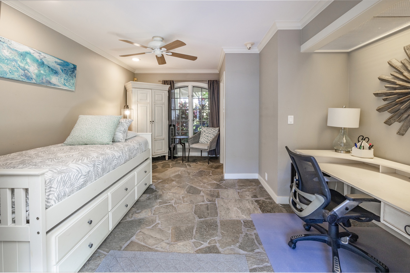Honolulu Vacation Rentals, Moana Lani - Main House - Daybed by night, desk by day, all on a stone floor that suits sandy feet.