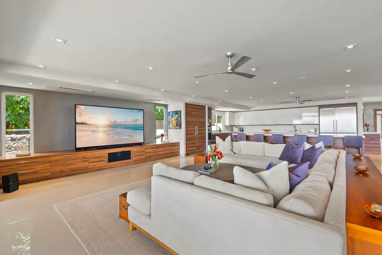 Honolulu Vacation Rentals, Diamond Head Beachfront Estate 9BR - A deep sectional and a wall screen make this the room for a movie night in.