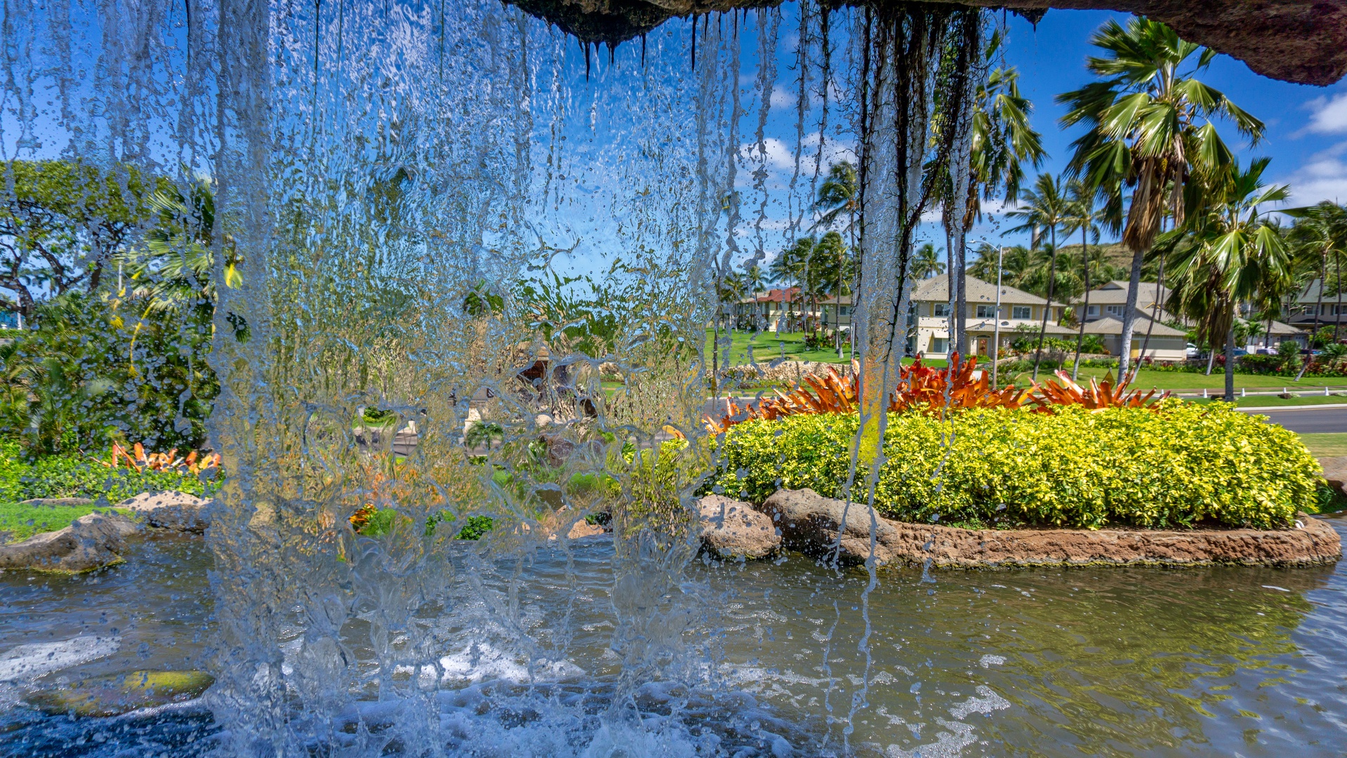 Kapolei Vacation Rentals, Coconut Plantation 1074-4 - A look through the waterfalls.