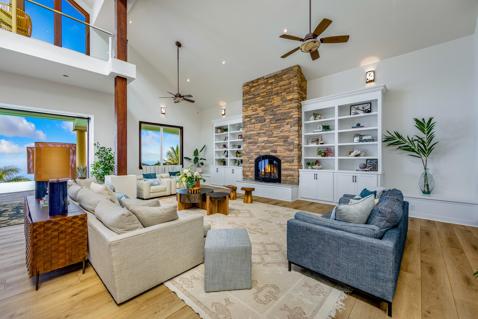 Kailua Kona Vacation Rentals, Kailua Kona Estate** - Spacious living area with a stone fireplace to gather with your loved ones.