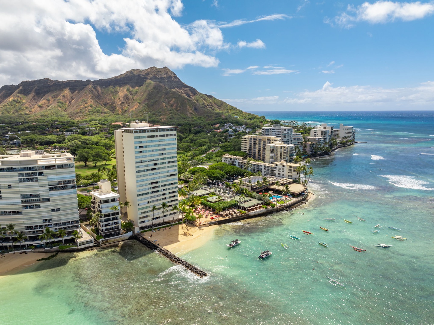 Honolulu Vacation Rentals, Colony Surf Luxe - Aerial perspective reveals the building’s rare balance of city access and beachfront tranquility—ideal for all guest types.