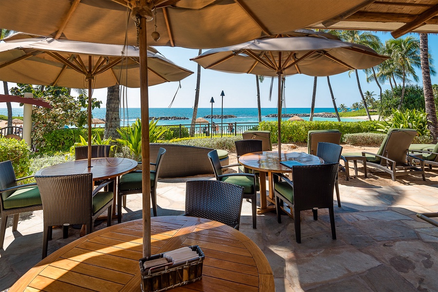 Kapolei Vacation Rentals, Ko Olina Beach Villas B210 - Outdoor dining pavilion with ocean backdrop.
