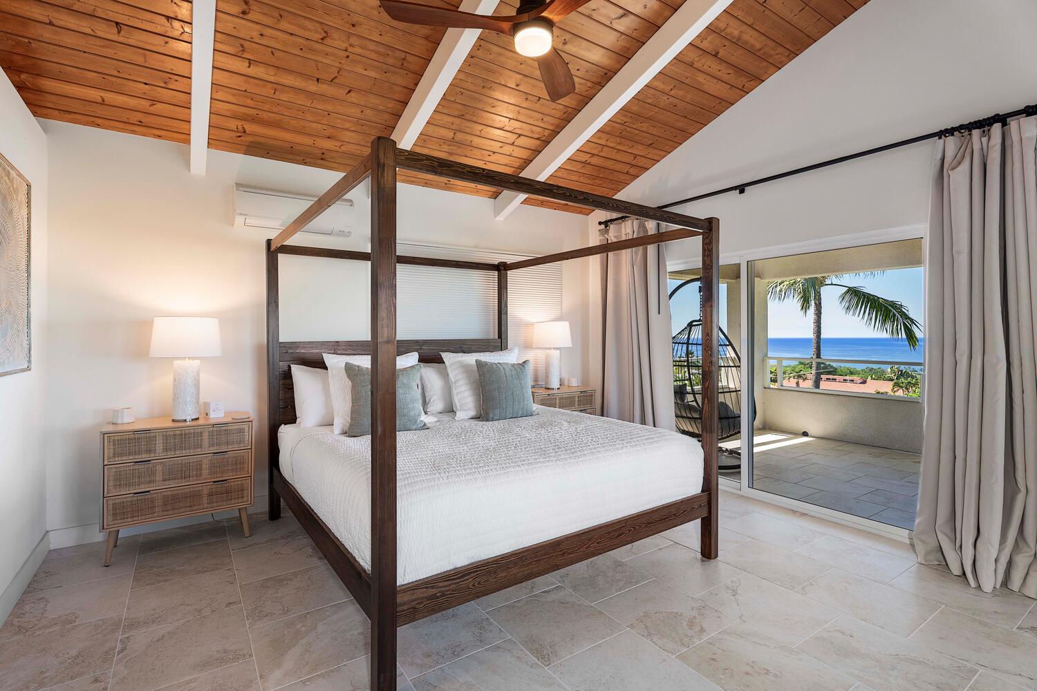 Kailua Kona Vacation Rentals, Ho'okipa Hale - Indulge in the primary suite: a luxurious king bed awaits beneath vaulted ceilings and island woodwork.