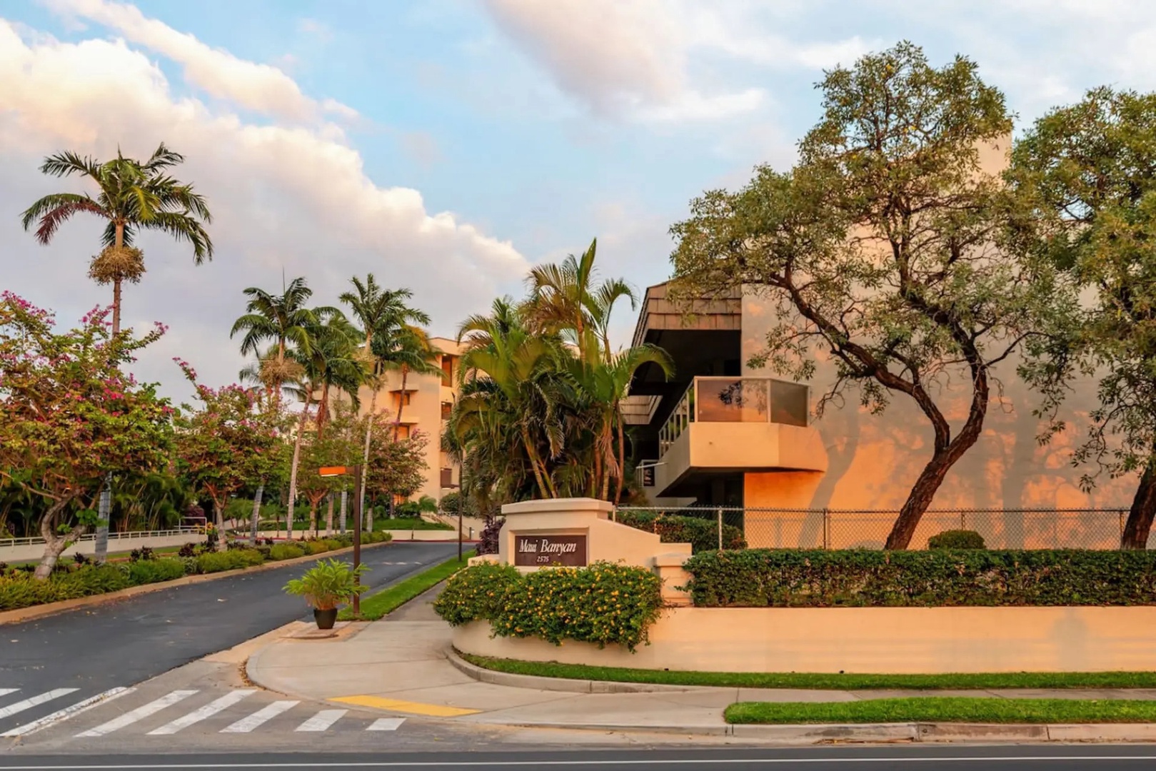Kihei Vacation Rentals, Maui Banyan H306 - The Maui Banyan sign catches the last gold light as you pull in from a day out.