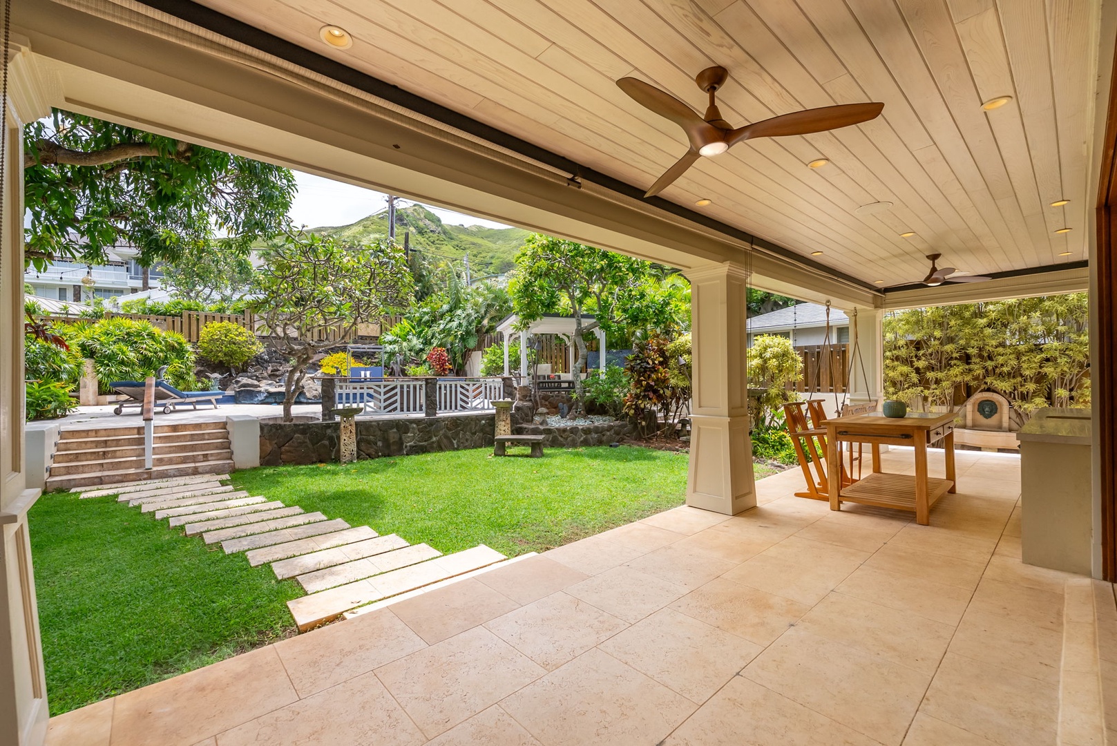Kailua Vacation Rentals, Leaf House - Relax in your covered lanai overlooking lush green lawns, tropical gardens, and tranquil mountain views—the perfect setting for morning coffee or evening conversation.