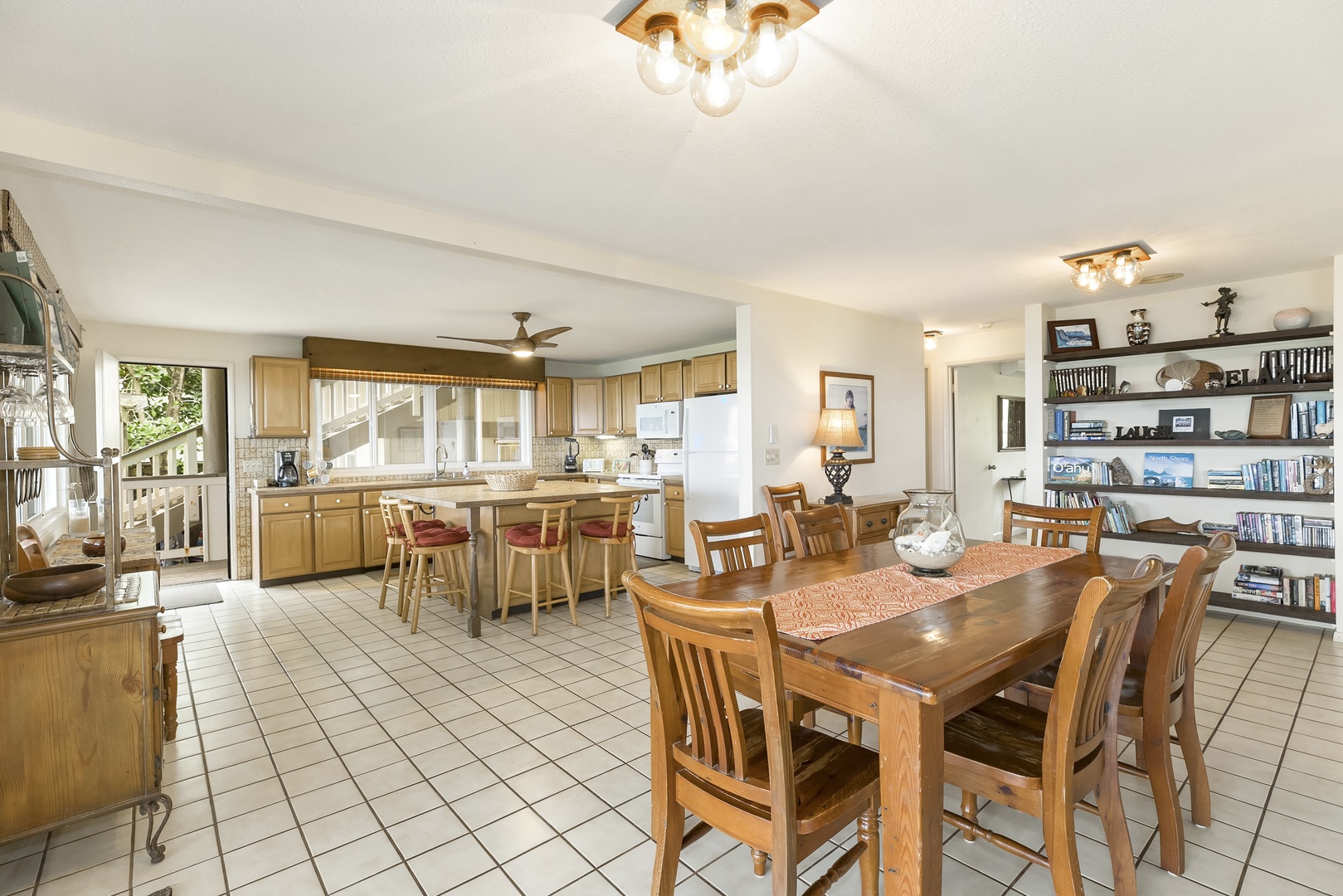 Haleiwa Vacation Rentals, Hale Kimo - The dining area is adjacent to the kitchen with open living spaces.