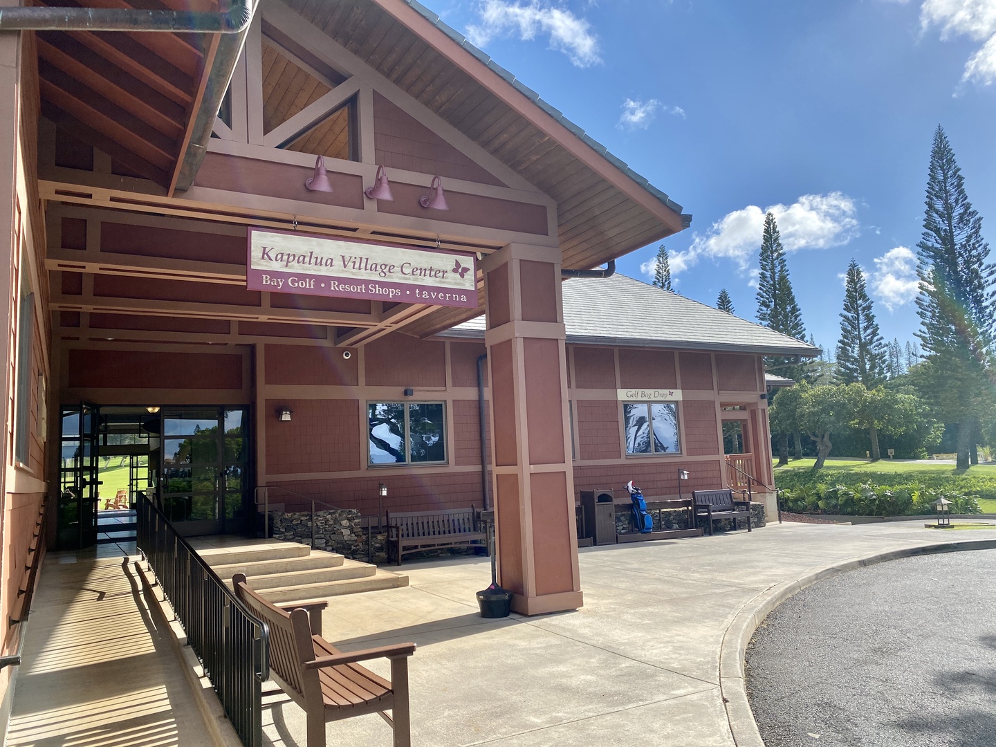 Lahaina Vacation Rentals, Kapalua Ridge 1622 - Spacious community center entrance, offering a welcoming atmosphere under a clear sky.