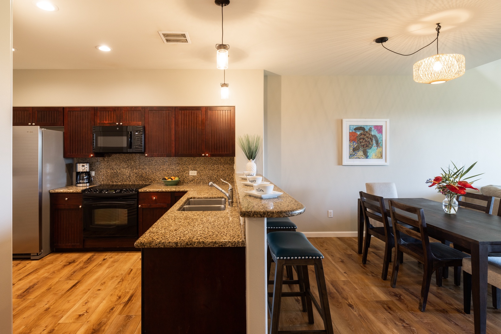 Waikoloa Vacation Rentals, Fairway Villas at Waikoloa Beach Resort E34 - The kitchen is well stocked and allows the chef to engage with everyone