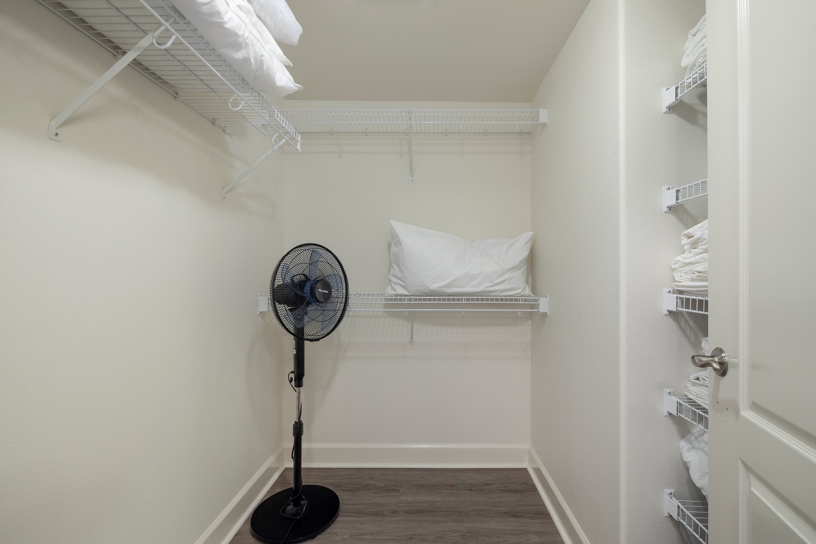 Kapolei Vacation Rentals, Ko Olina Kai 1061F - Generous closet space with shelving and a fan for added comfort.