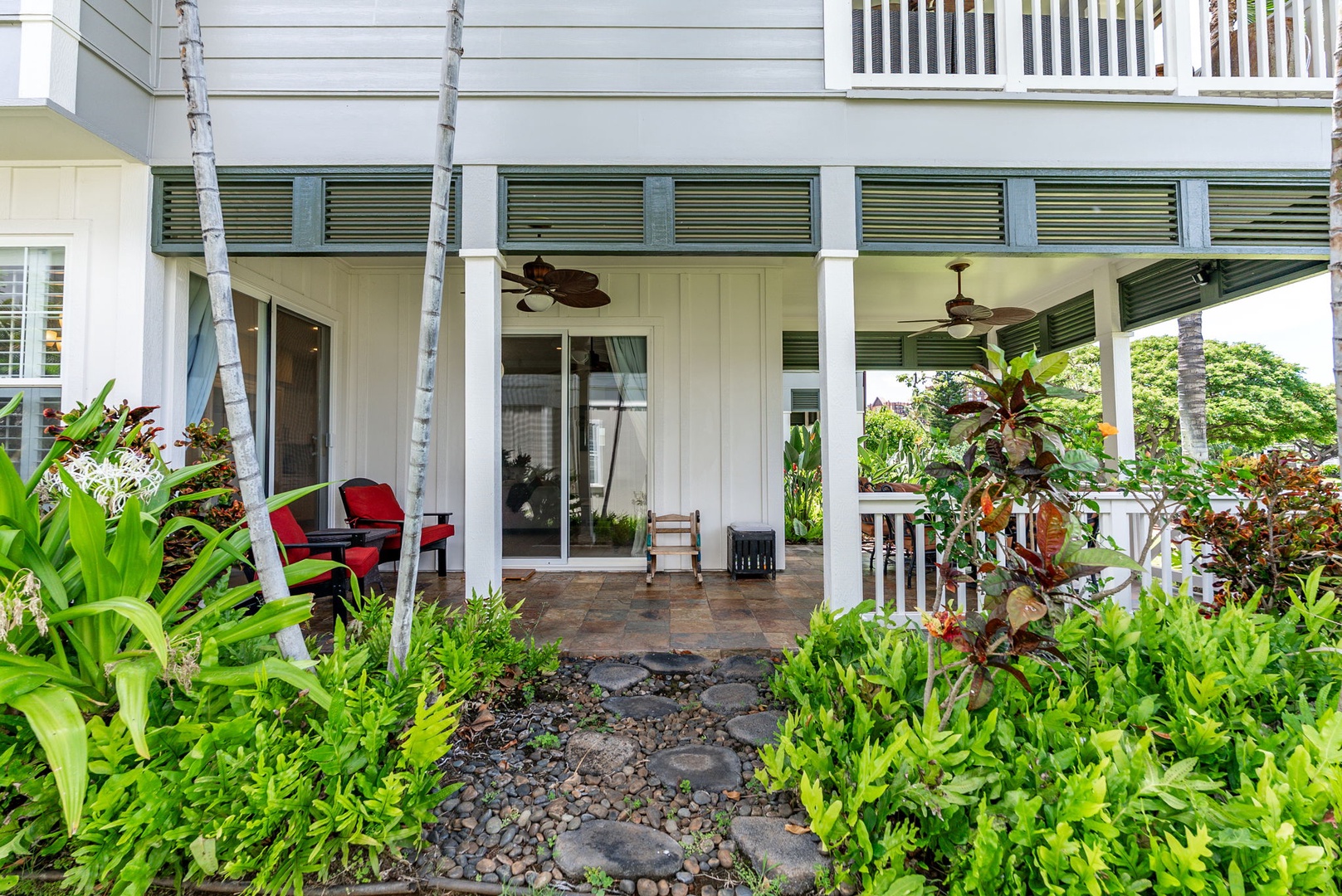 Kapolei Vacation Rentals, Coconut Plantation 1080-4 - The front approach, thick with plantings, with parking right at the door.