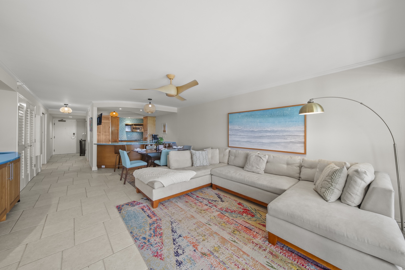 Honolulu Vacation Rentals, Aston Waikiki Beach Tower 602 - Experience the ultimate relaxation in a spacious living area with a coastal vibe.