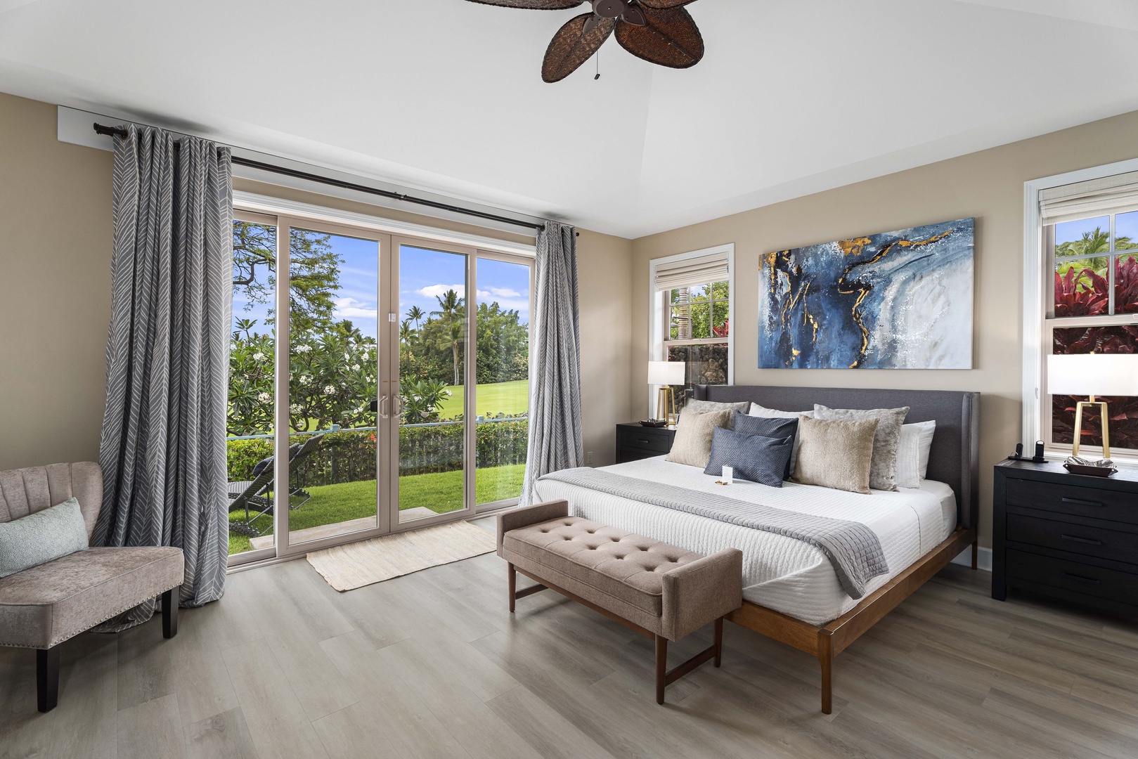 Kailua Kona Vacation Rentals, Holua Kai #27 - The primary suite wakes up to garden light through a full wall of windows.