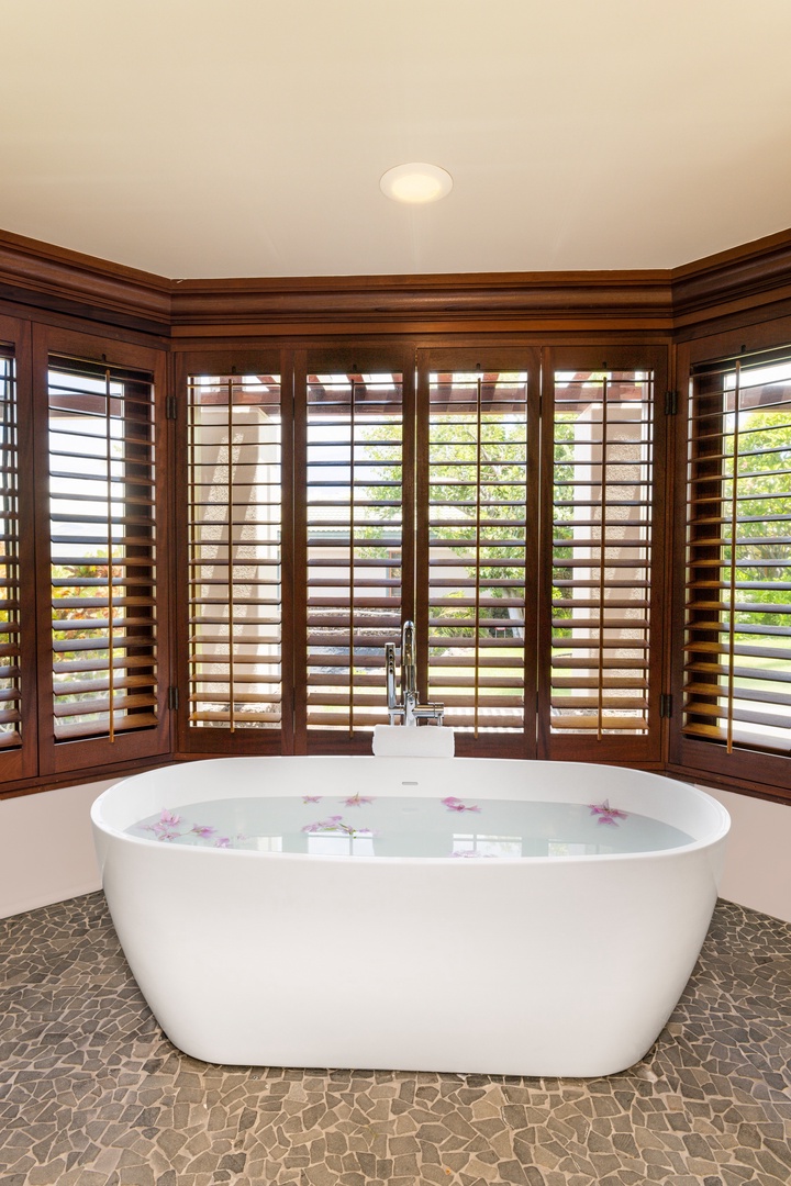 Kamuela Vacation Rentals, Champion Ridge 7 - Soak in the deep freestanding tub framed by tropical gardens and warm island light.