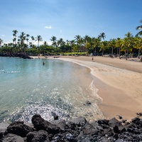 Kamuela Vacation Rentals, Mauna Lani KaMilo #503 - Just minutes from your villa, Mauna Lani Beach Club offers calm, crystal-clear waters ideal for snorkeling, paddleboarding, or simply lounging on the soft white sand under swaying palms.
