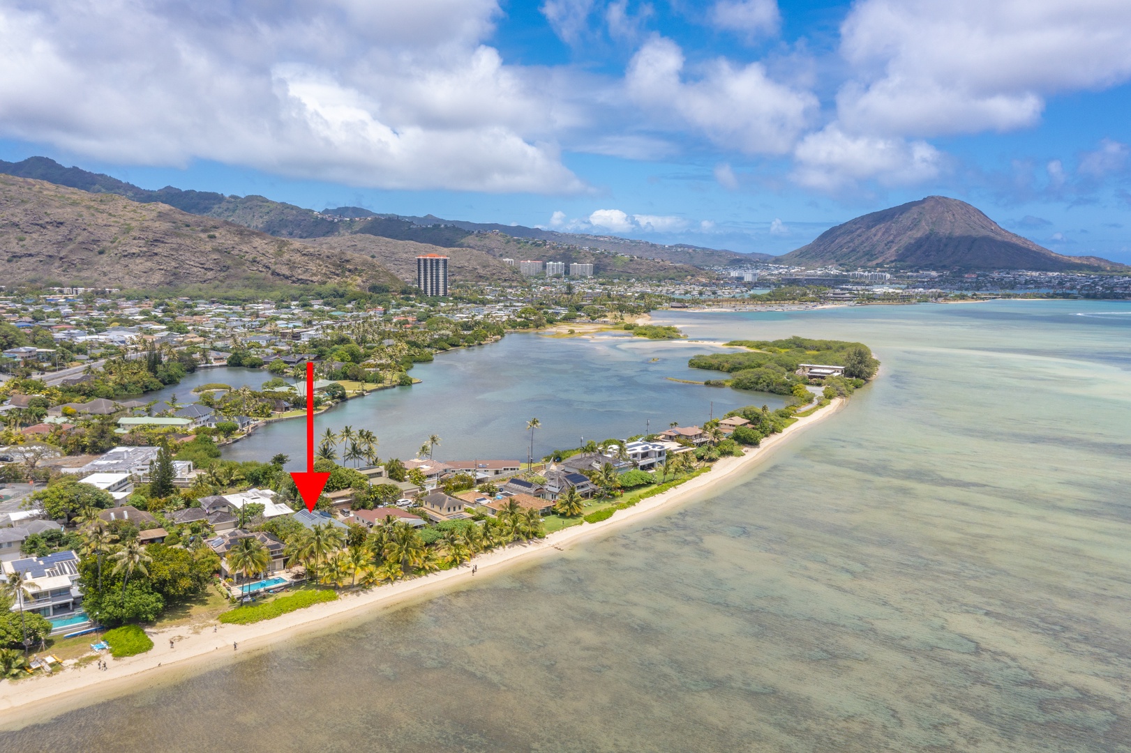 Honolulu Vacation Rentals, Honolulu Beachfront Retreat - Distant aerial view showcasing the home’s placement within the scenic beachfront neighborhood.