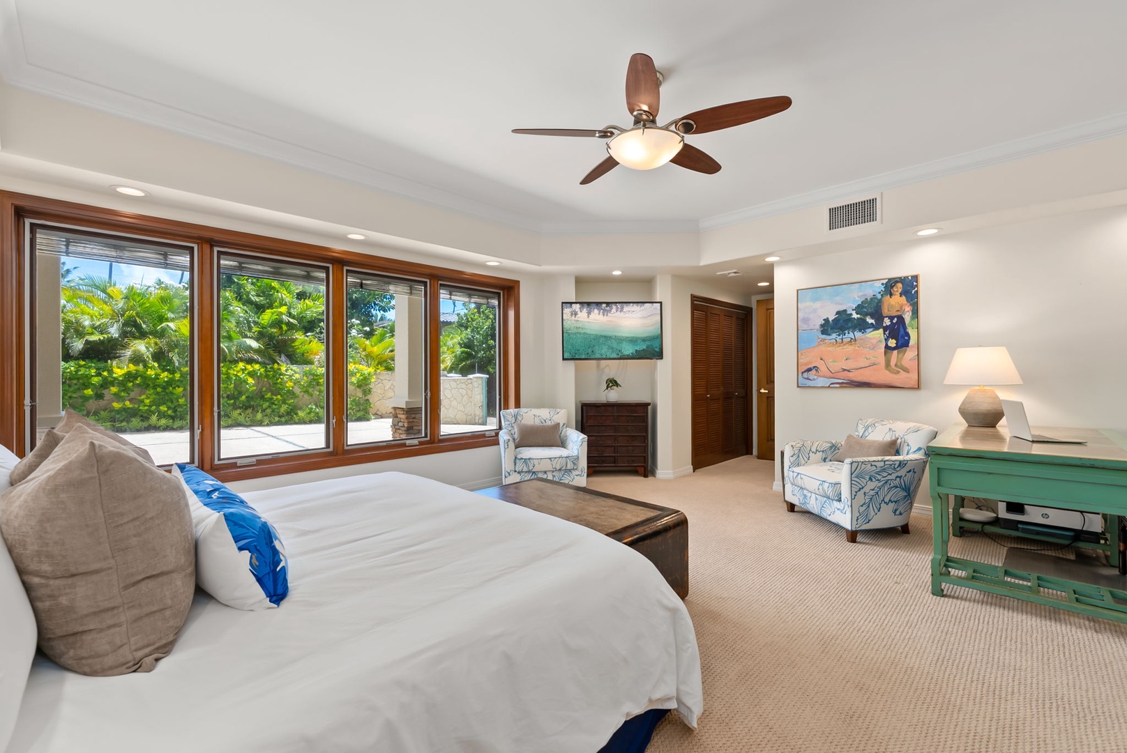 Honolulu Vacation Rentals, Maunalua Estate - Tropical garden views and crisp linens bring a relaxed coastal feel to this spacious bedroom.