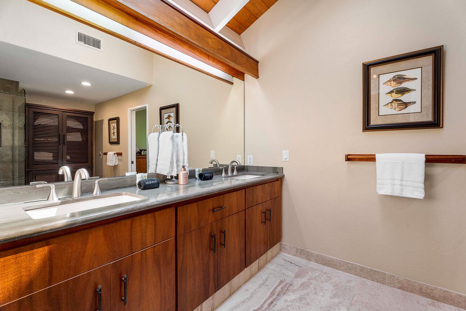 Kailua Kona Vacation Rentals, Kanaloa at Kona 3303 - The Primary bathroom has large vanity with double sinks and storage.