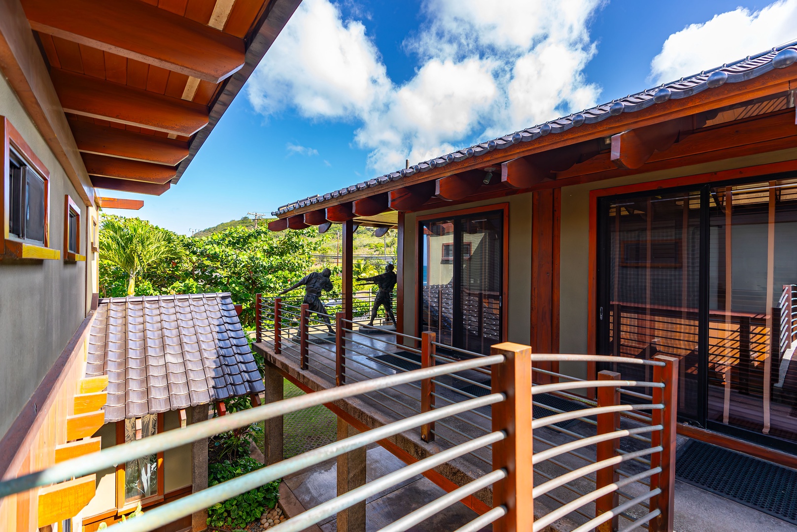 Haleiwa Vacation Rentals, Samurai House - Pathway leading to dojo, surrounded by tropical landscaping.