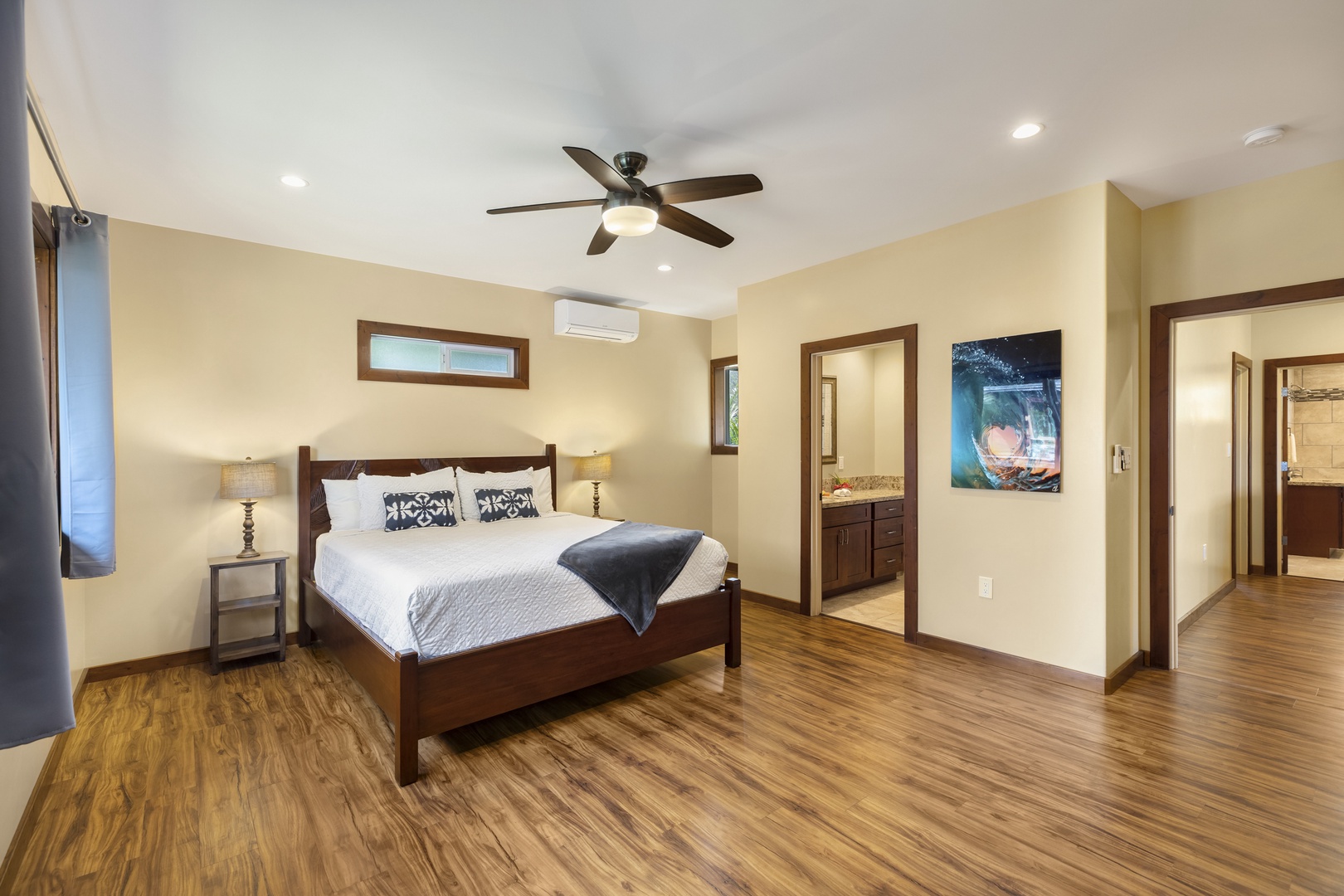 Haleiwa Vacation Rentals, Waimea Dream - The upstairs primary bedroom has a king-size bed and en suite bath.