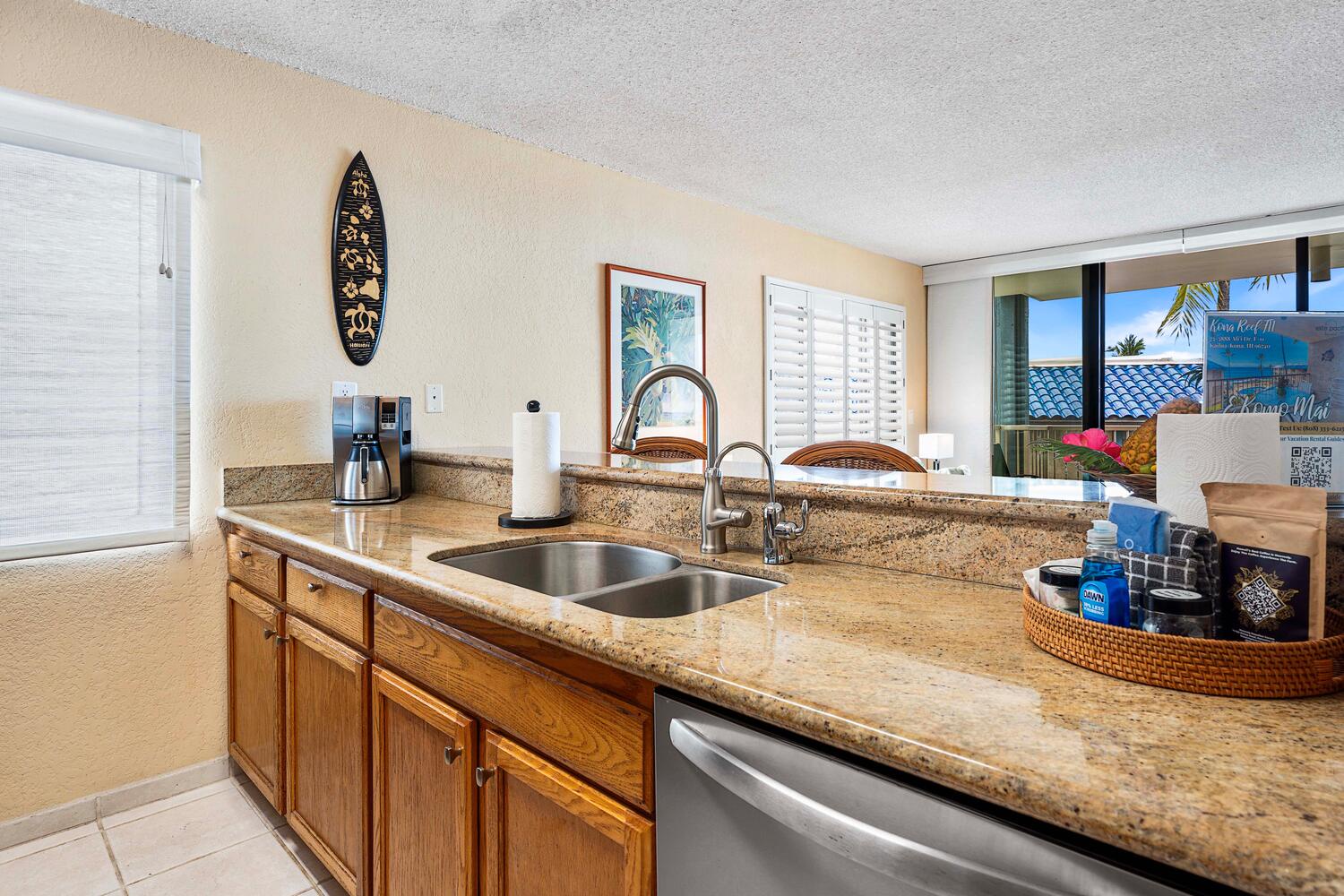 Kailua Kona Vacation Rentals, Kona Reef F11 - Kitchen has Granite Counters, Upgraded Cabinets, and Bar-seating.