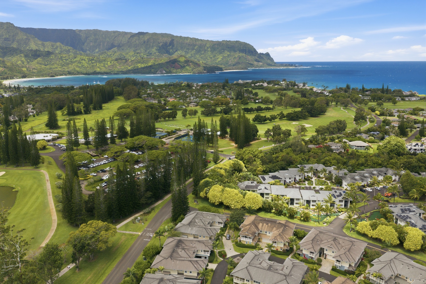 Princeville Vacation Rentals, Hale Kaua'i - From above, the community's golf courses, coastline, and mountain scenery create a remarkable setting.