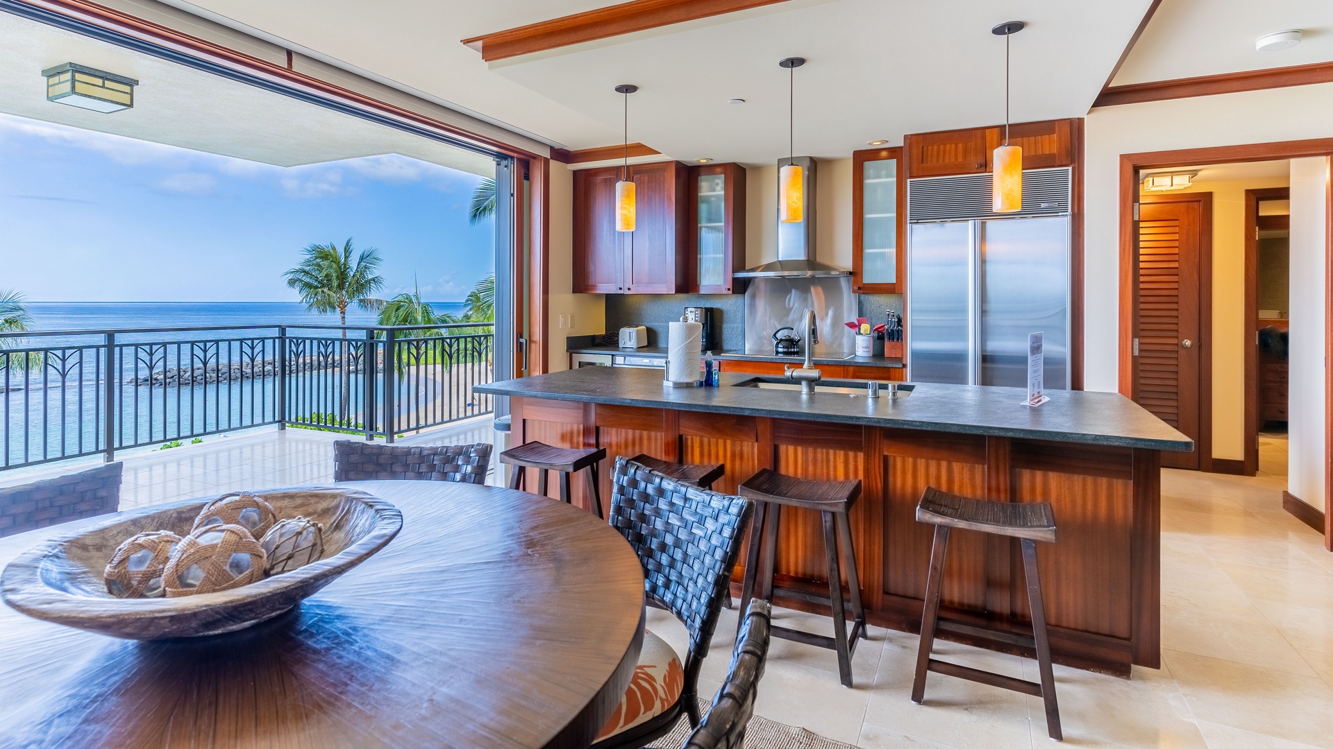 Kapolei Vacation Rentals, Ko Olina Beach Villas B410 - The fully equipped kitchen designed by Roy Yamaguchi with panoramic views.