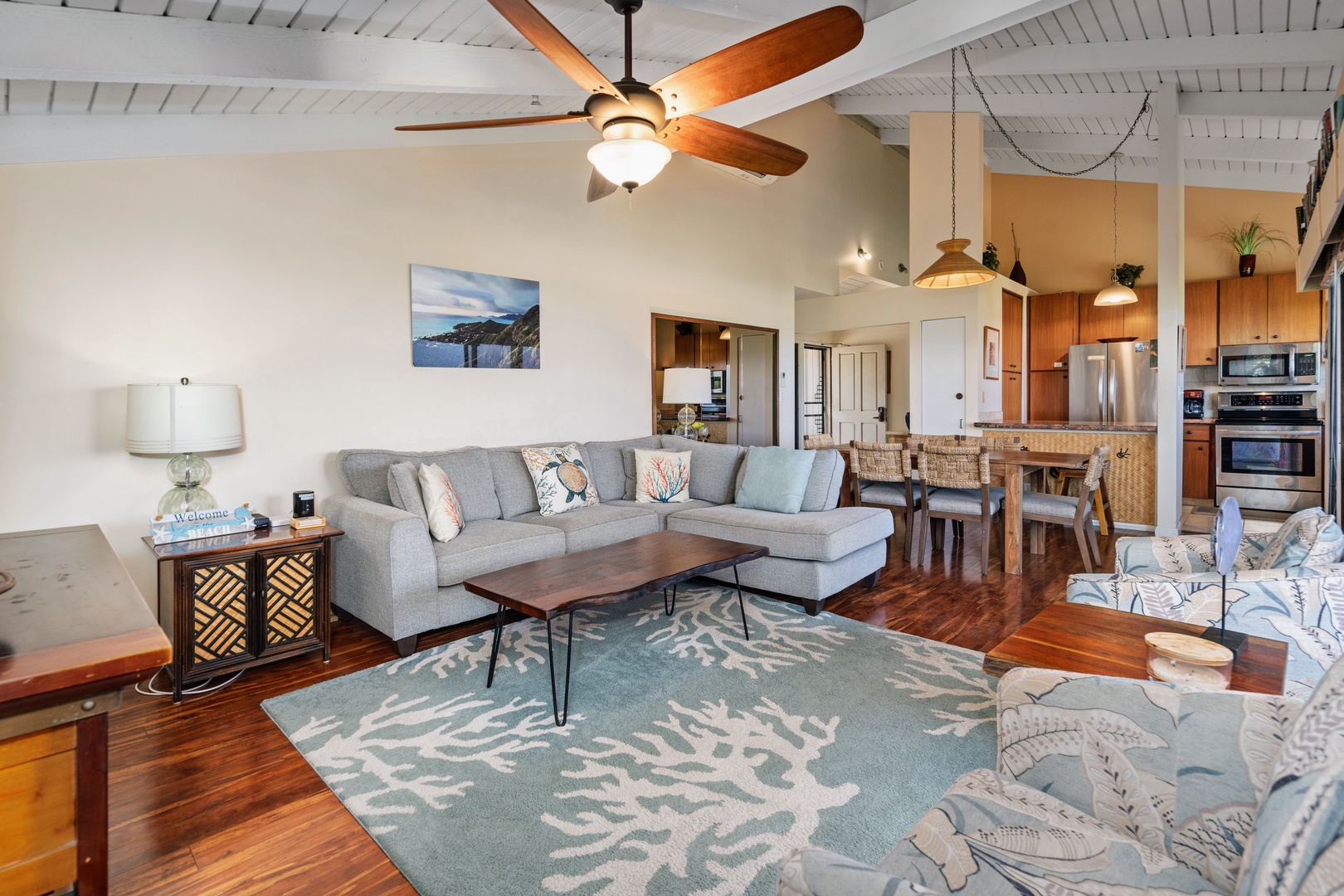 Kihei Vacation Rentals, Wailea Ekolu 204 - One open room holds the sofa, dining table, and kitchen, so dinner never means missing the conversation.