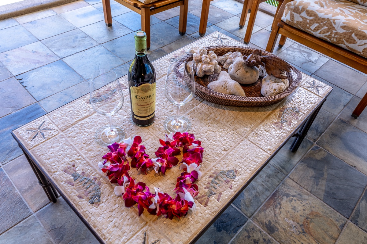 Kailua Kona Vacation Rentals, Fairways Villa 120A - Romance awaits with wine, tropical flowers, and seashells artfully arranged for your perfect getaway moment.