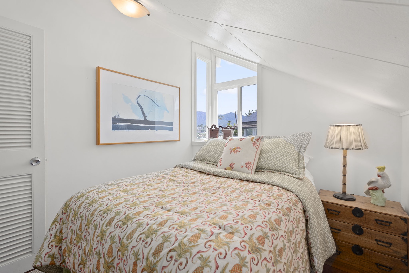 Waianae Vacation Rentals, Ma'ili Blue Estate - Drift off to dreamland in your cozy bedroom sanctuary, where soft linens and gentle natural light create the perfect retreat for restful nights.