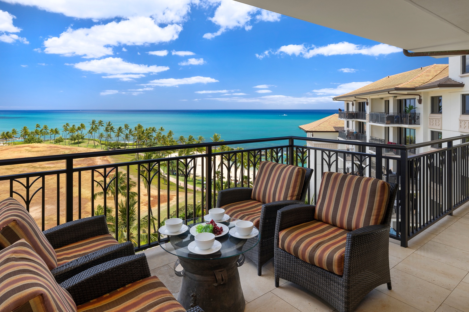 Kapolei Vacation Rentals, Ko Olina Beach Villas B901 - Sip your morning coffee on your private balcony while gazing at stunning ocean views and swaying palms.