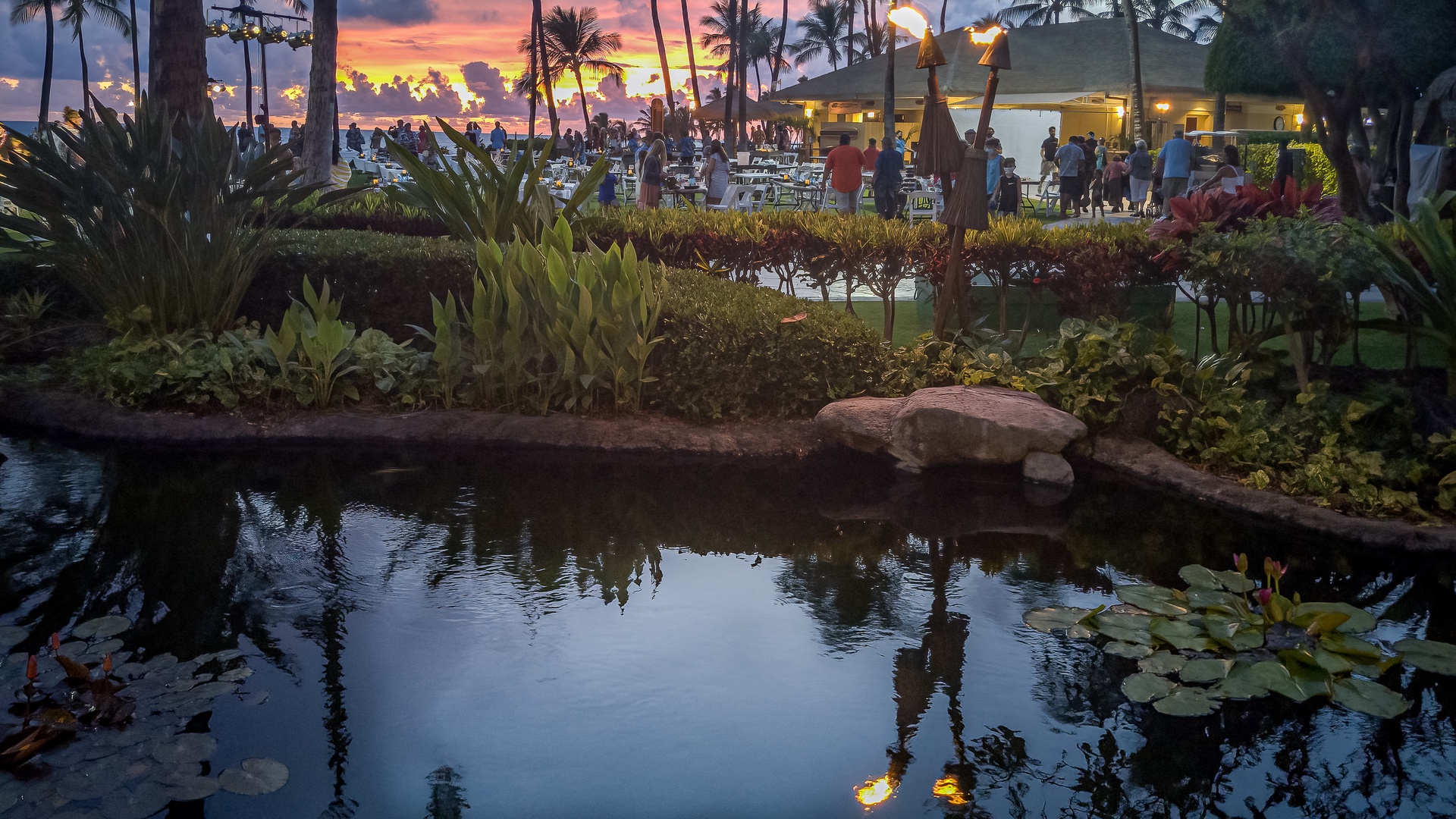 Kapolei Vacation Rentals, Coconut Plantation 1074-1 - Reflective waters and tiki torches.