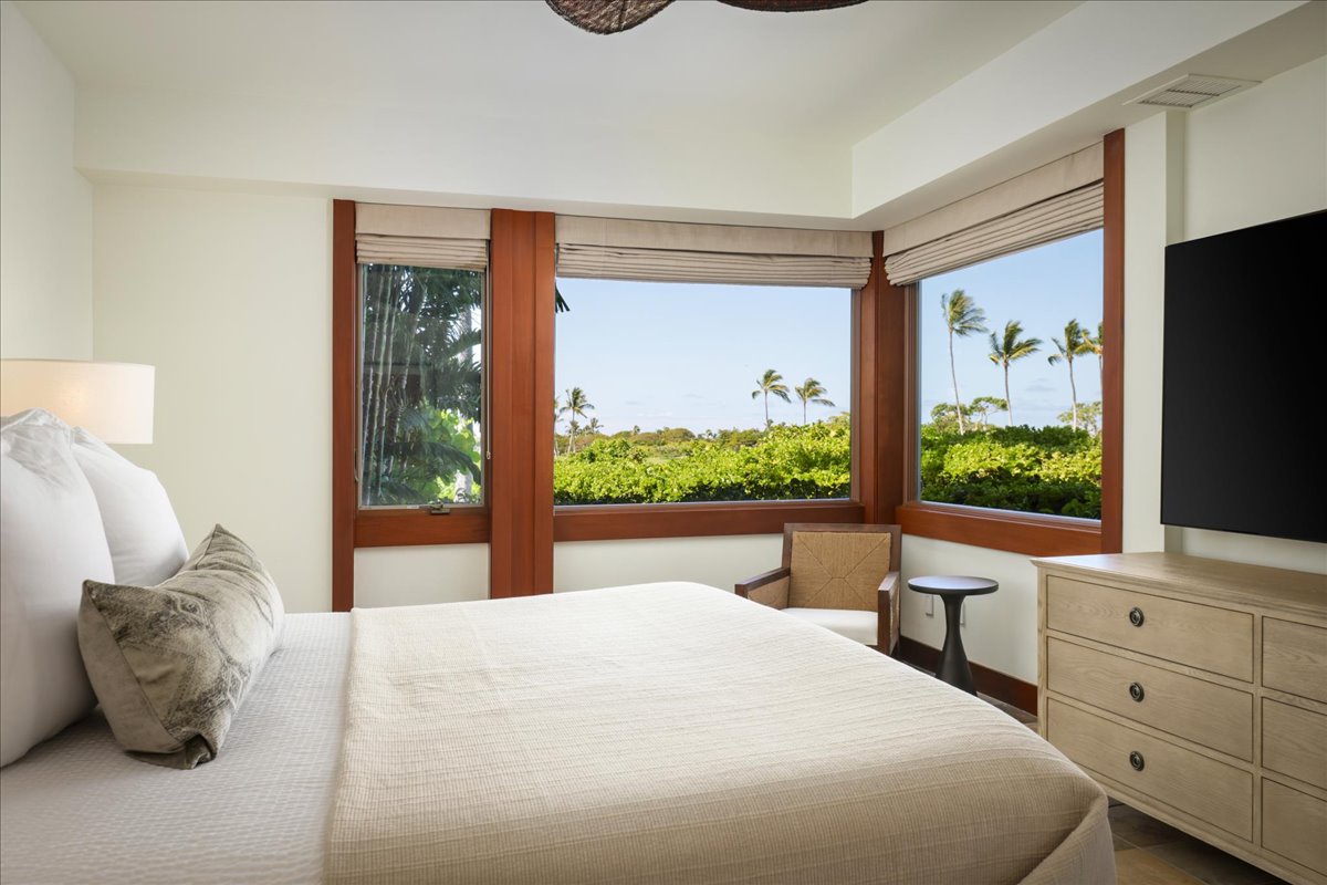 Kailua Kona Vacation Rentals, 2BD Fairways Villa (120C) at Four Seasons Resort at Hualalai - Alternate view of primary bedroom suite with abundant natural light and corner picture windows.