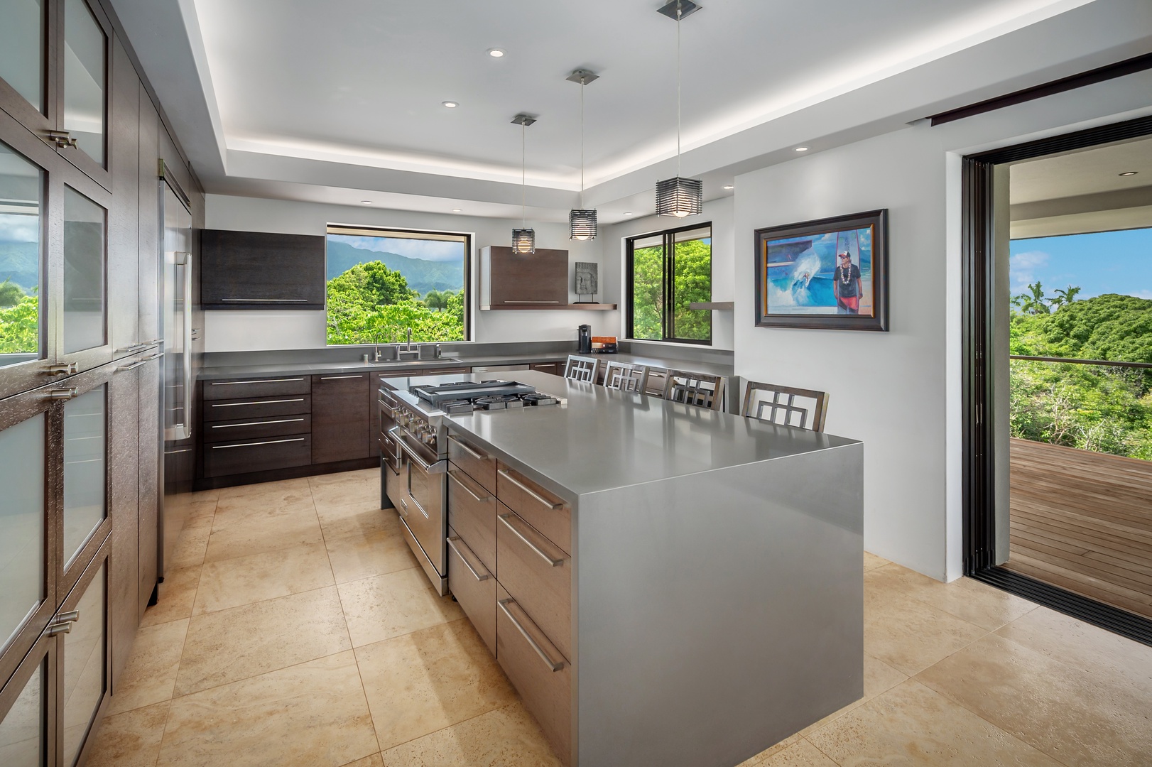 Princeville Vacation Rentals, Hanalei Plantation Villa - Gourmet kitchen featuring a spacious island with additional seating, fully equipped for culinary enthusiasts.