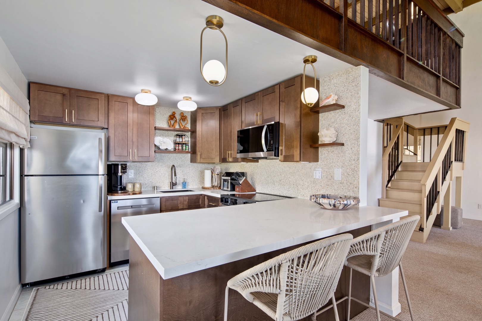 Kailua Kona Vacation Rentals, Keauhou Kai C301 - A full kitchen with island seating, so someone always ends up perched while dinner comes together.