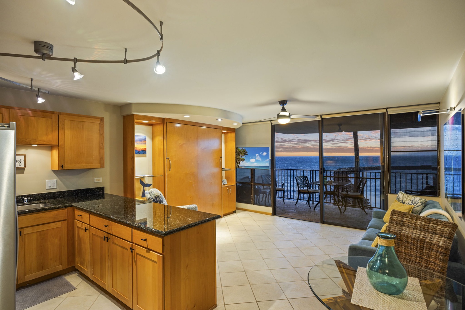 Wailuku Vacation Rentals, Milowai 310 - Prep dinner at the granite island and carry it straight out to the lanai when you're done.