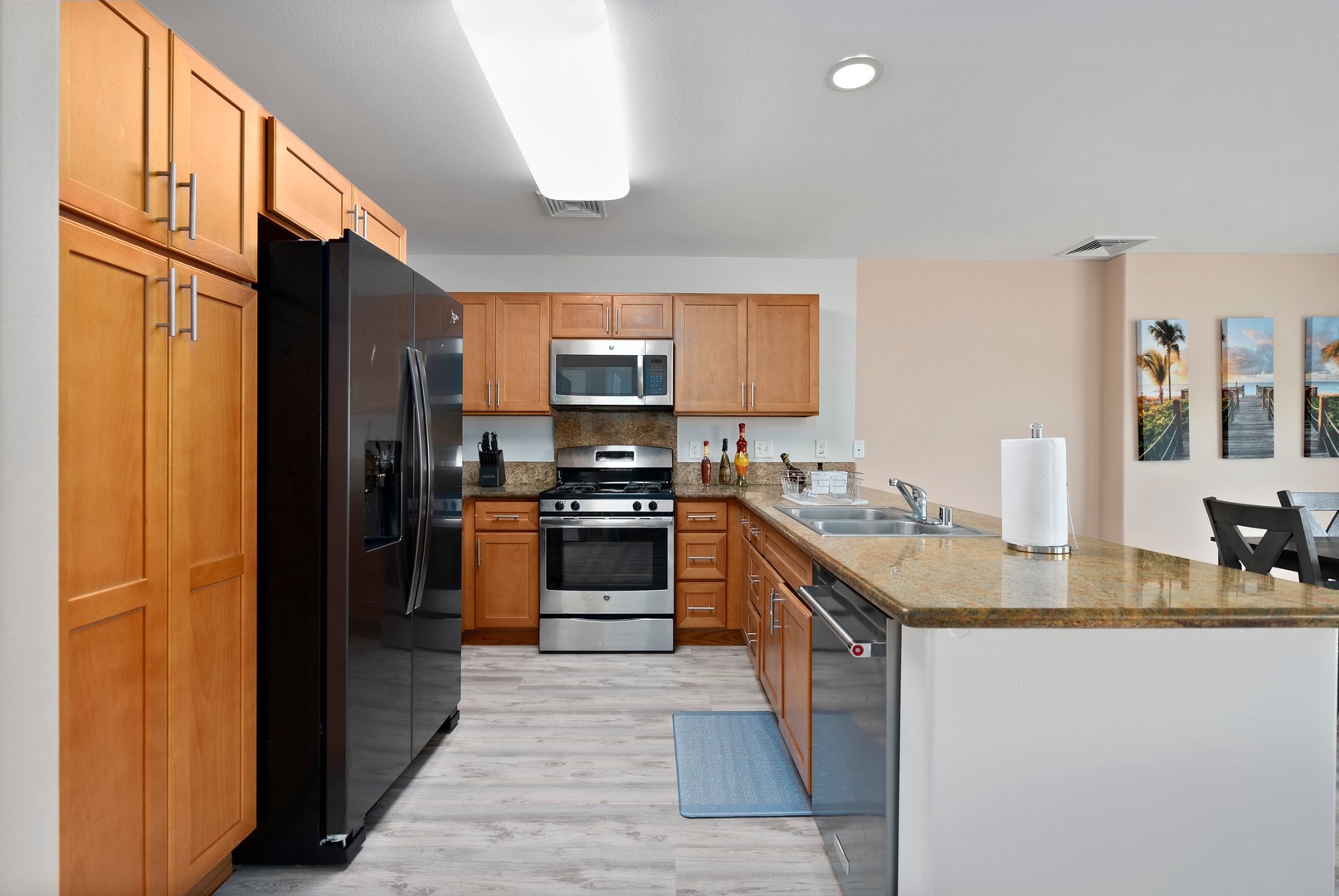 Kapolei Vacation Rentals, Kilipue Retreat - Spacious kitchen with granite counters and stainless appliances—perfect for home-cooked meals during your stay.