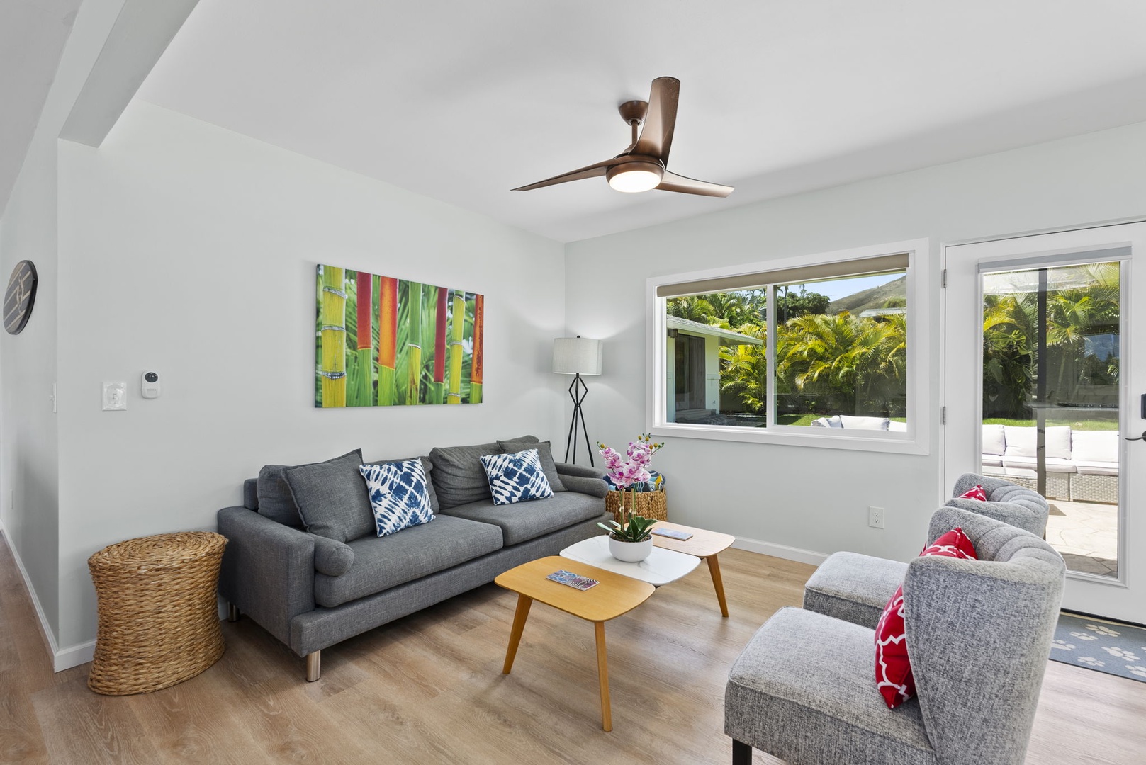 Kailua Vacation Rentals, Hale Alapi'i Lanikai Getaway - Unwind in this chic living space featuring a comfy sofa, stylish accents, and ample natural light.