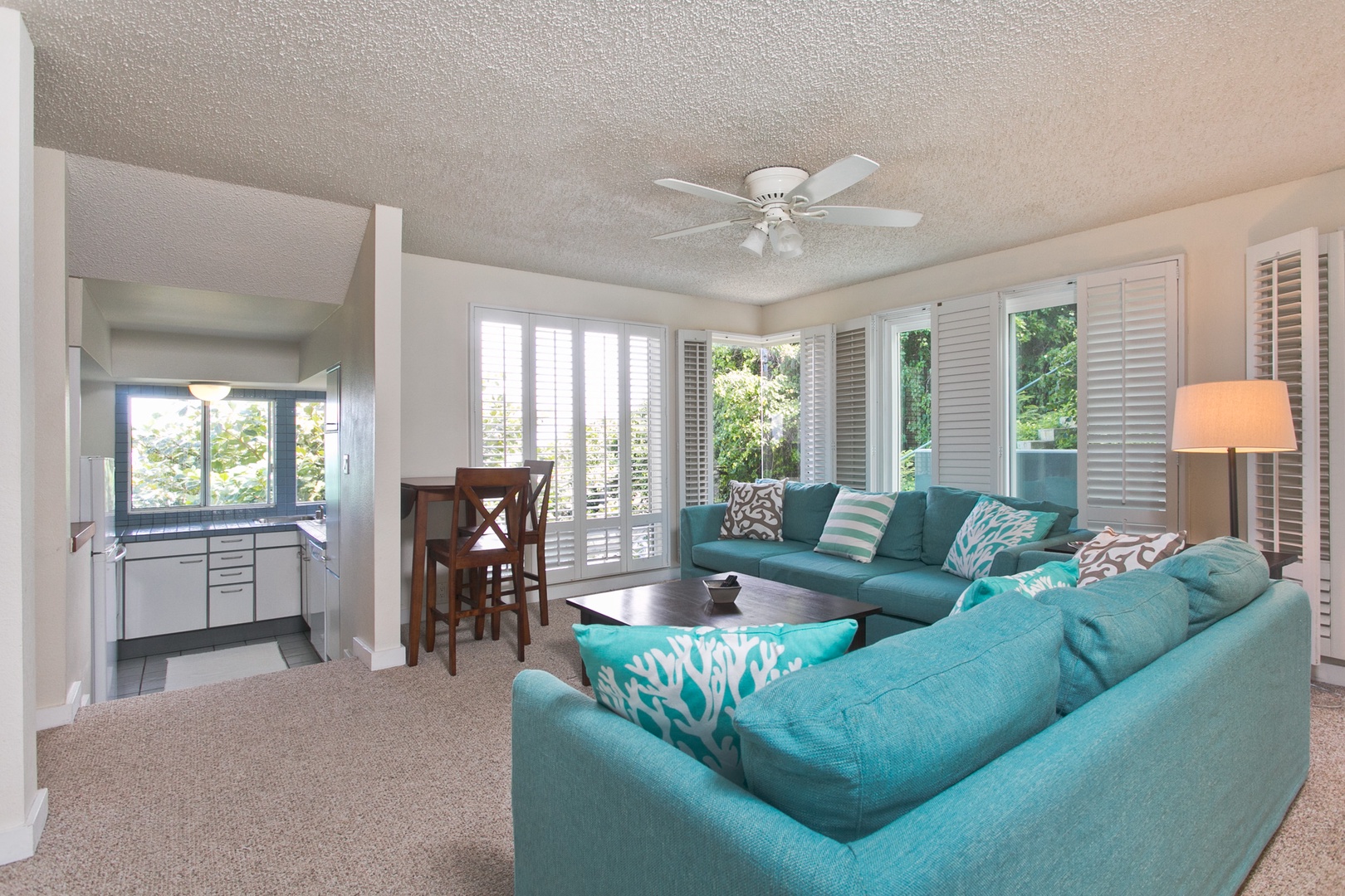 Kailua Vacation Rentals, Lanikai Village* - Hale Kolea: Primary suite comes with a lounge area with plenty of seats, dinette, and a mini-kitchen.