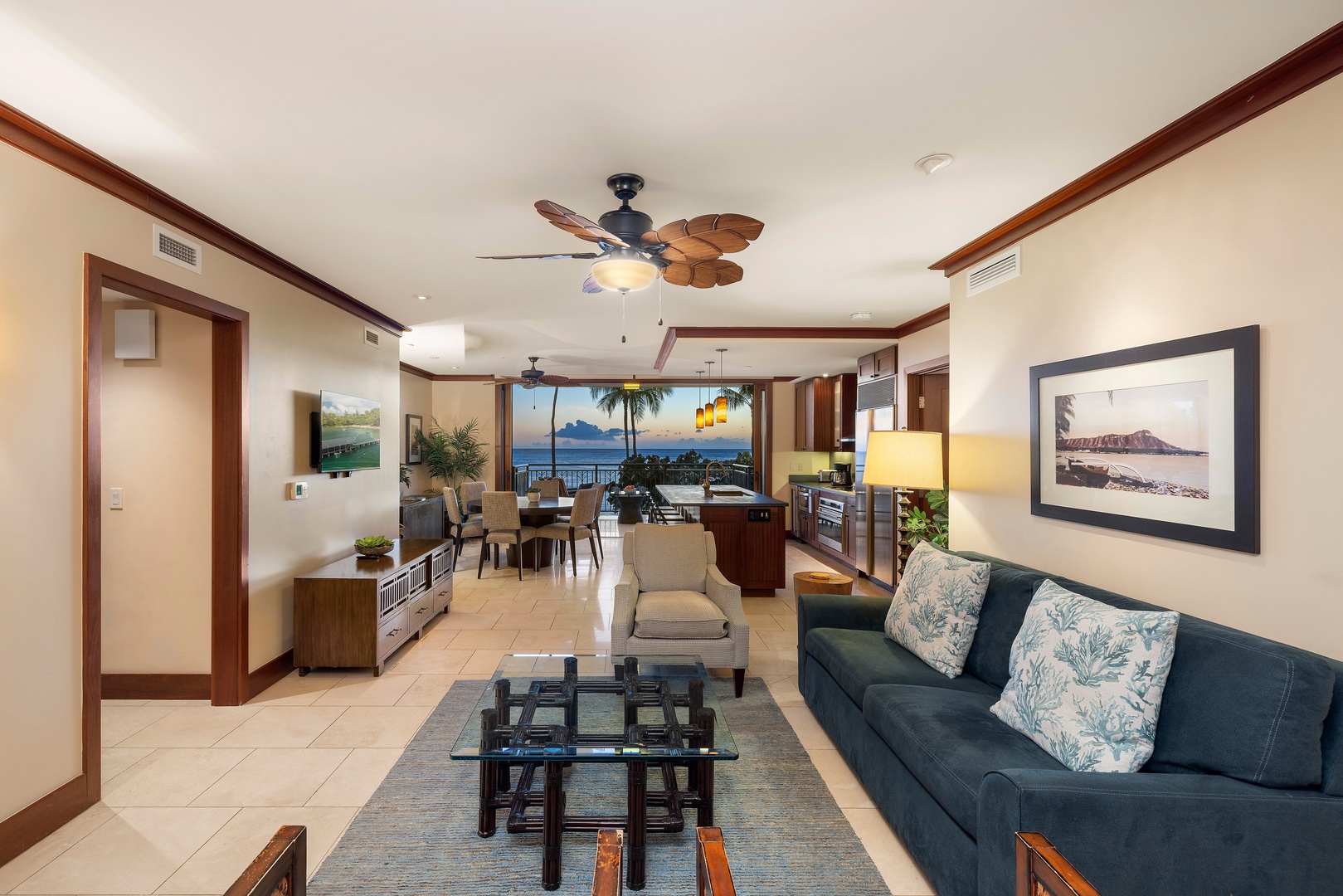 Kapolei Vacation Rentals, Ko Olina Beach Villas B210 - Open-plan living and dining space with lanai access.