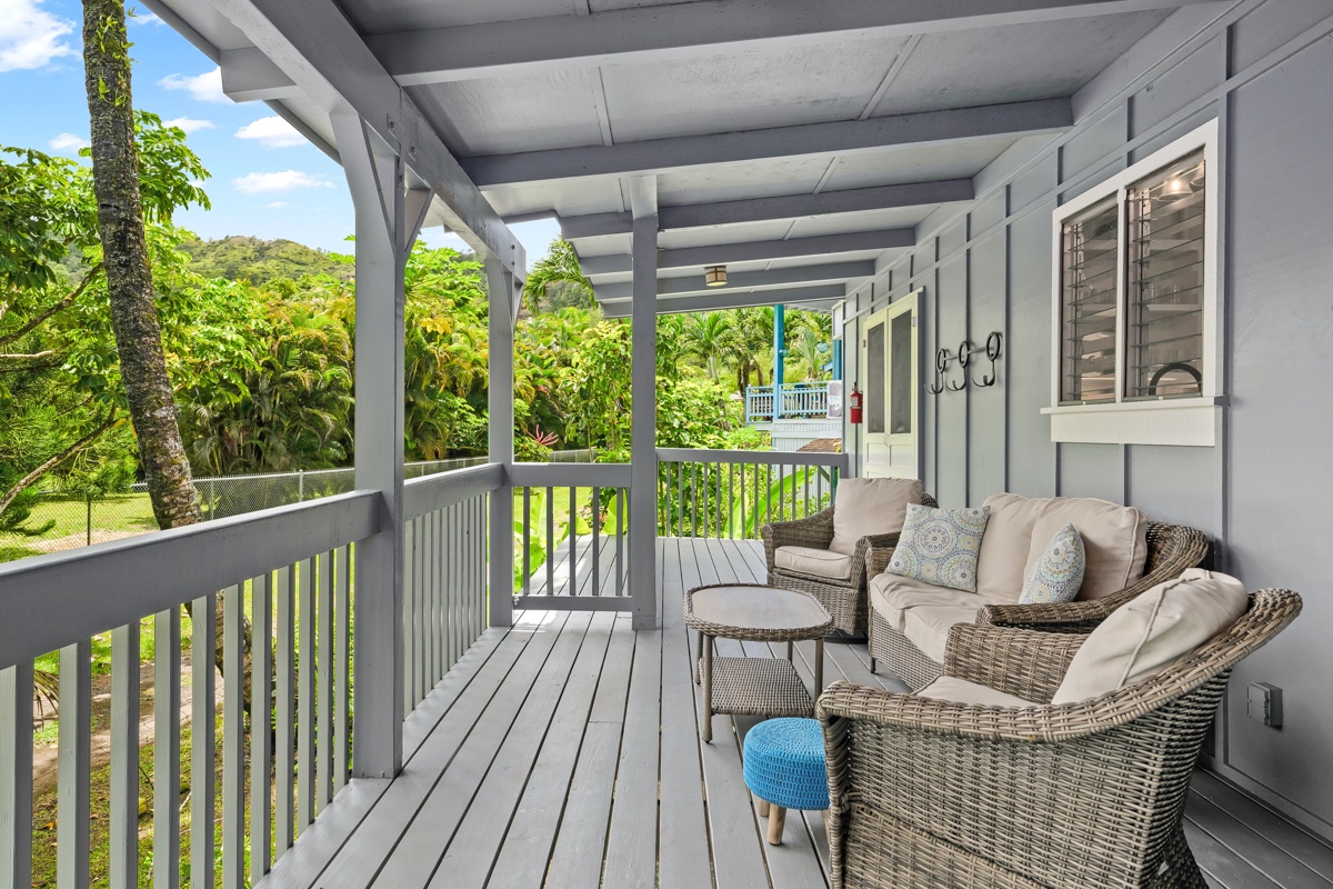 Hanalei Vacation Rentals, Hale Kanani (Kaua'i) TVNC 1342 - Settle into the lanai chairs while the garden and green ridgeline fill the view.