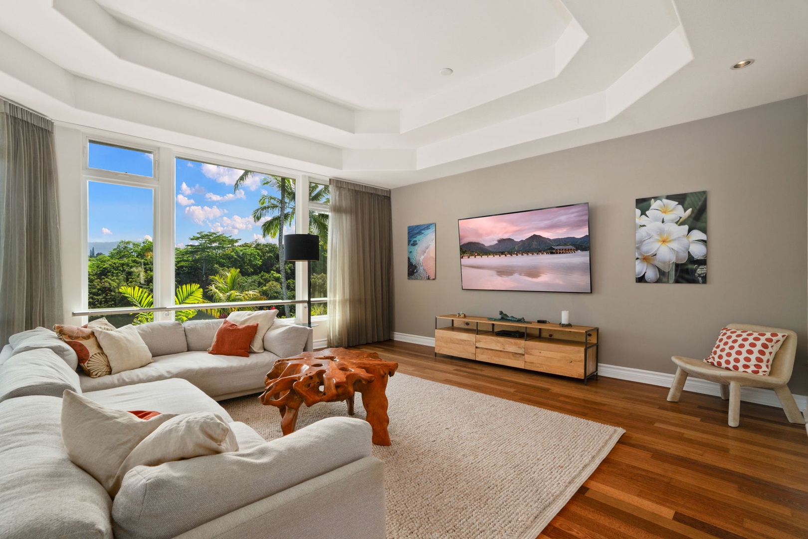Princeville Vacation Rentals, Kaiulani #8 - Everyone fits on the deep white sectional after a long day out.