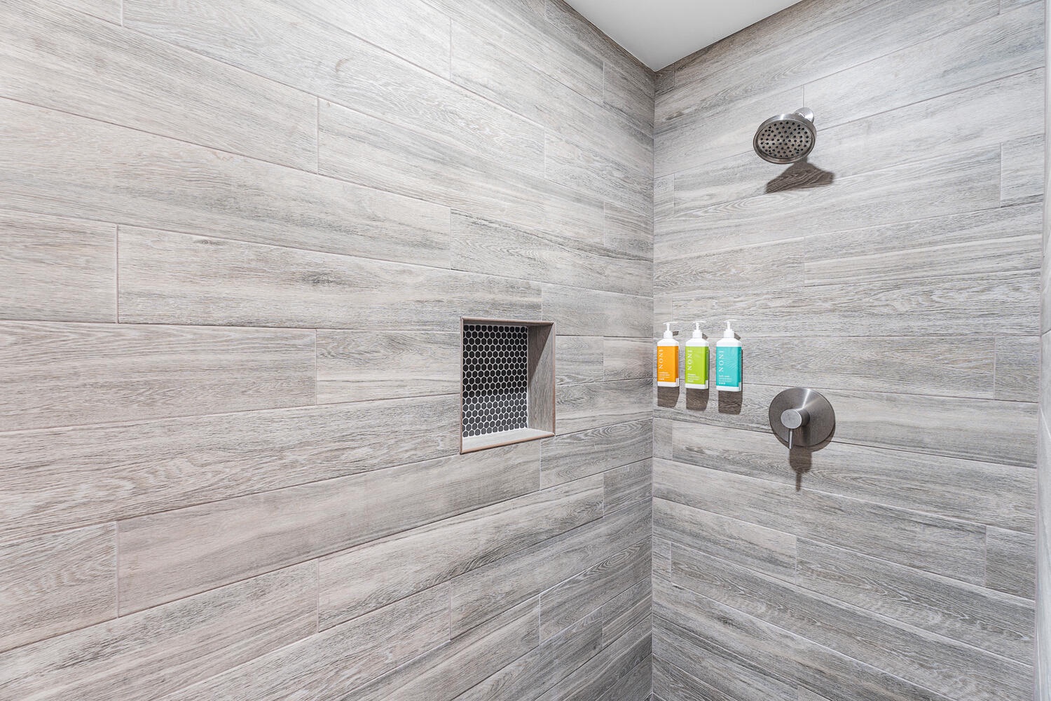 Kailua-Kona Vacation Rentals, Hale Kope Kai - Stylish walk-in shower with rainfall head and modern tile—refreshing after a beach day.