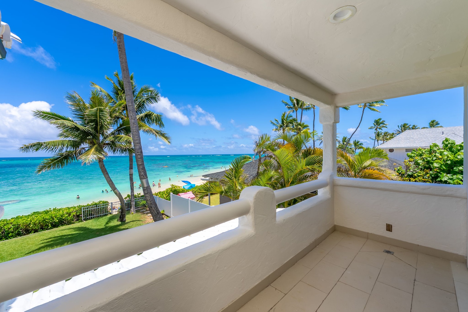 Kailua Vacation Rentals, Lanikai Sunrise Estate - Soak in postcard-worthy views from this queen bedroom’s lanai—perfect for a morning coffee or evening wine.