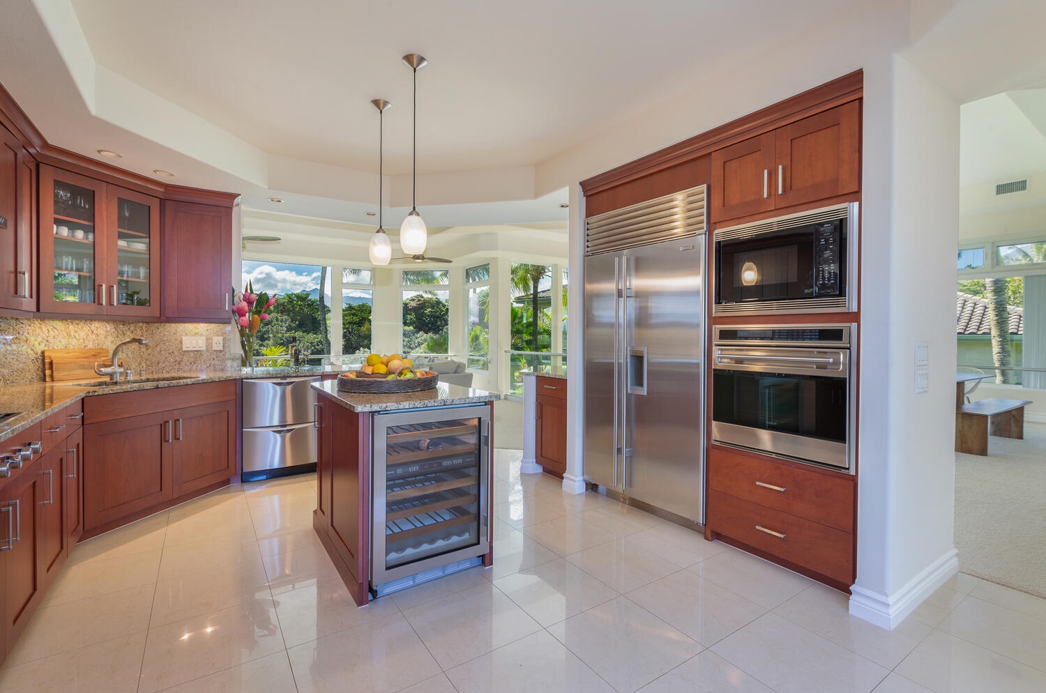 Princeville Vacation Rentals, Kai Naia Hale - Chef's kitchen with Wolfe gas range and Sub-Zero fridge