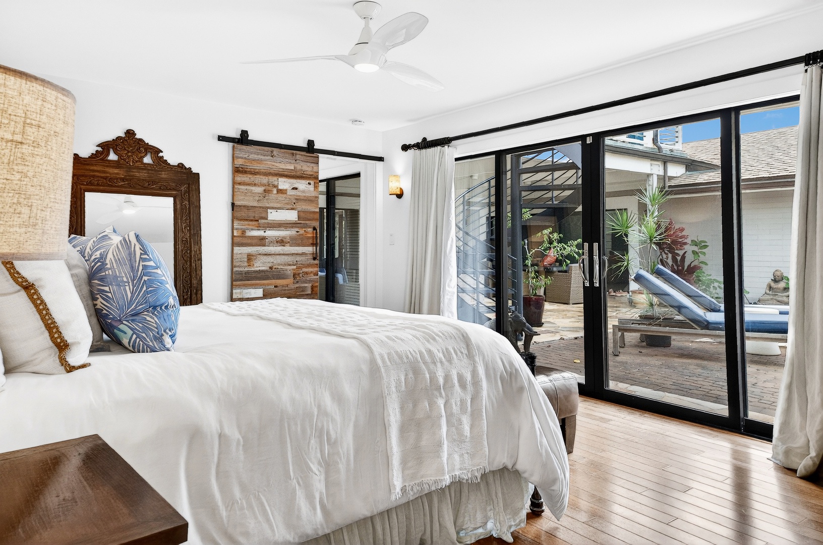 Kailua Vacation Rentals, Hale Ohana - Wake up in your serene bedroom sanctuary, where crisp linens and tropical breezes await through sliding doors to your private lanai.