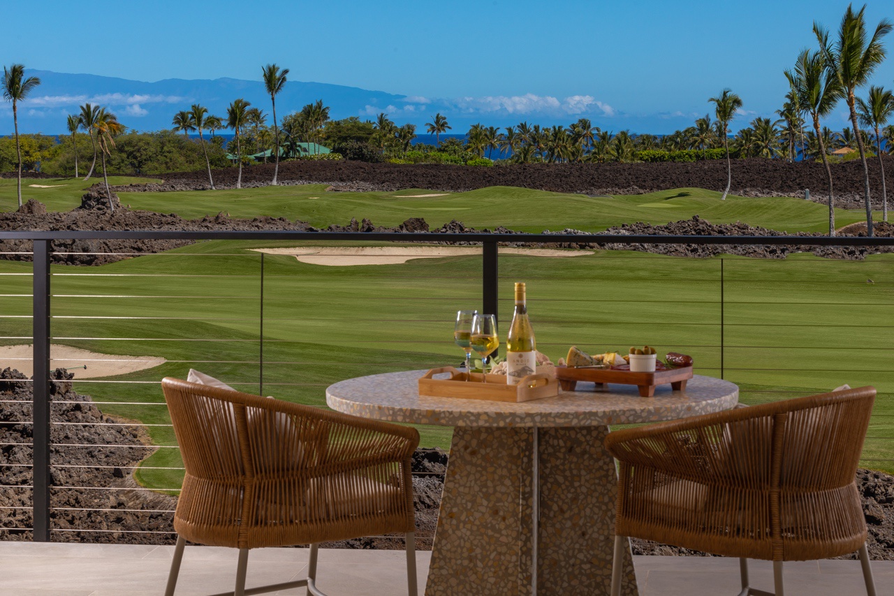 Waimea Vacation Rentals, 5BD Mauna Lani Lux Golf Estate (4) at One Ocean - This inviting lanai located outside of the upstairs bedroom is perfectly positioned for enjoying scenic views of the golf course and distant mountains