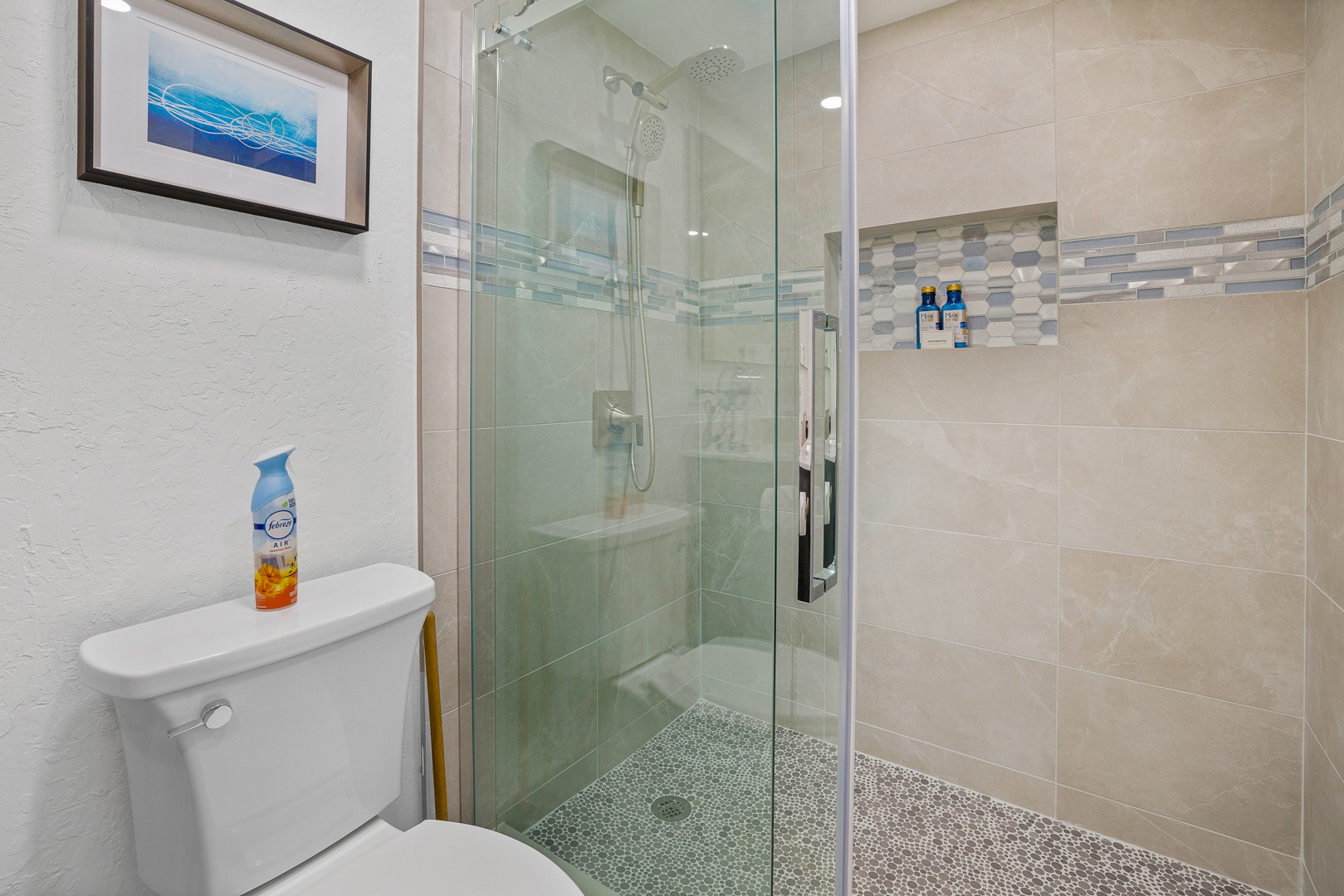 Lahaina Vacation Rentals, Kaanapali Shores 213 - A modern and welcoming bathroom with a sleek glass-enclosed shower, elegant tiles