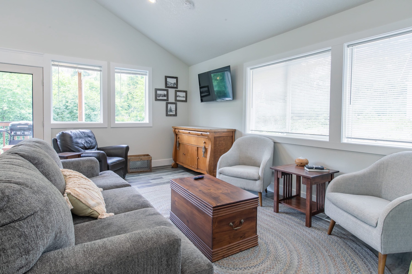 Nehalem Vacation Rentals, Nehalem Coastal Oasis - The Living room couch turns into a pull out bed to host extra guests