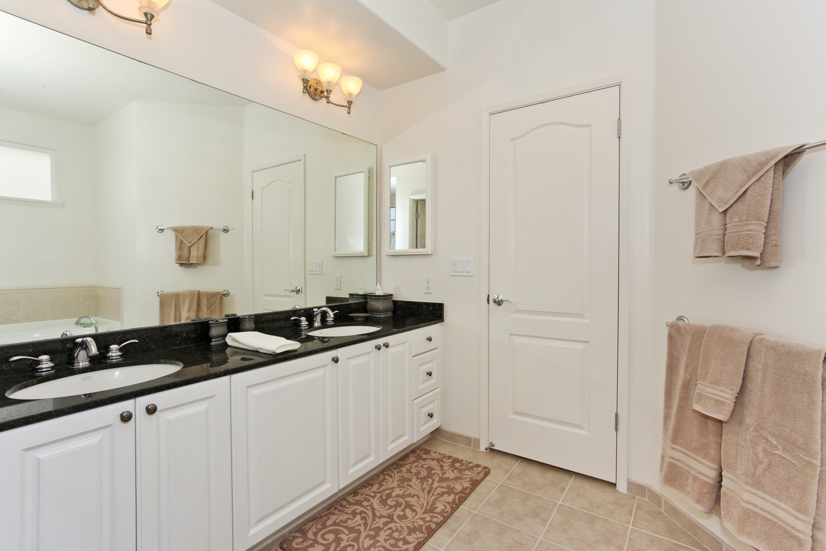 Kapolei Vacation Rentals, Ko Olina Kai Estate #20 - The primary guest bathroom with a large double vanity.