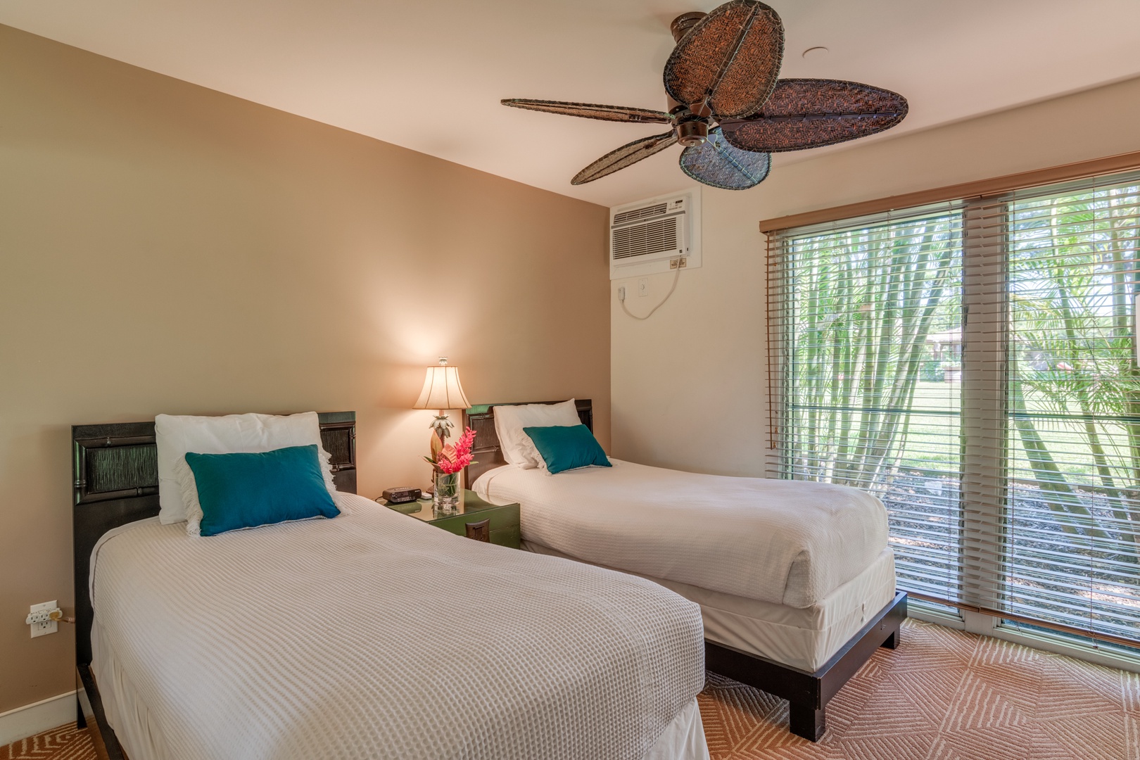 Lahaina Vacation Rentals, Aina Nalu D103 - Guest Bedroom 2 has 2 twin beds and a garden view
